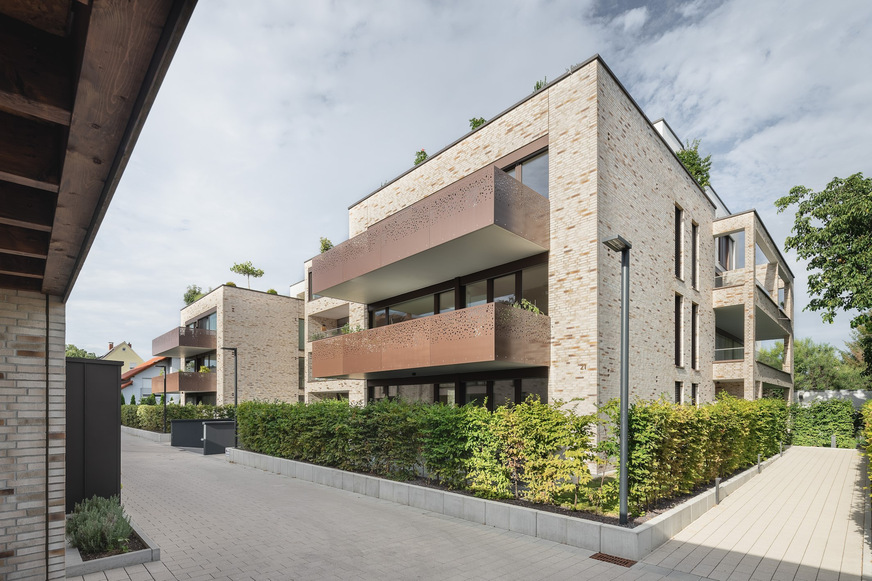 Bild 2 Im neuen Wohnquartier wurden gestalterische, ökologische und energetische Aspekte gesamtheitlich integriert.