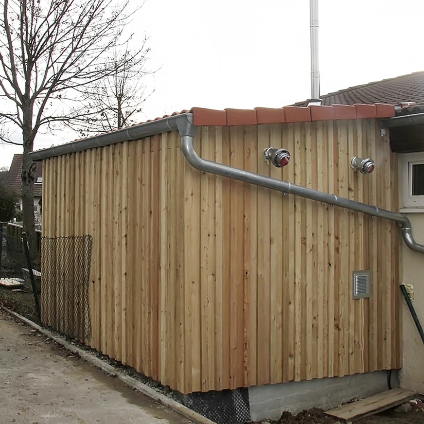 Bild 5&nbsp; A.B.S.-Referenz Kita Tausendfüßler Hessigheim mit Pelletlager neben dem Gebäude.