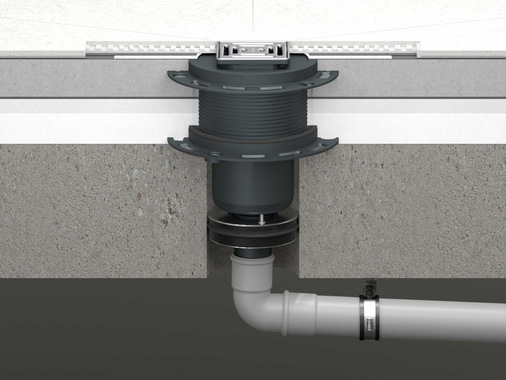 Dallmer: Senkrechtes Ablaufgehäuse mit Brandschutzelement am Entwässerungsanschluss.