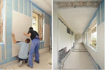 Bild 3 Montage einer der vorkonfektionierten Wandplatten des Fonterra-Systems auf der Unterlattung, dahinter ist die blaue diffusionsoffene Dampfsperre zu sehen, die eine 10 cm starke Mineraldämmung abschirmt. So wurde mit dem Trockenbau­system selbst in kleinen Räumen viel Heizleistung an die Wand gebracht.