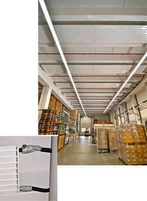 Abb. 5 Bei der Auslegung der Deckenstrahlplatten wurde darauf geachtet, dass sie ohne Änderung der Sprinkleranlage angebracht werden können. Für viele Montageplätze gab es darum Platten mit individuellen Abmessungen. Wichtiges Detail für die Jahreswärmebilanz: Durchgehende Dämmung der Vor- und Rücklaufleitungen.