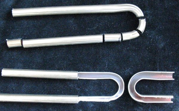 Aufgeschnittene Mäanderbögen aus Röhrenkollektoren ohne Ablagerungen und ohne Korrosionserscheinungen. - © Hannemann
Aufgeschnittene Mäanderbögen aus Röhrenkollektoren ohne Ablagerungen und ohne Korrosionserscheinungen. - Hannemann