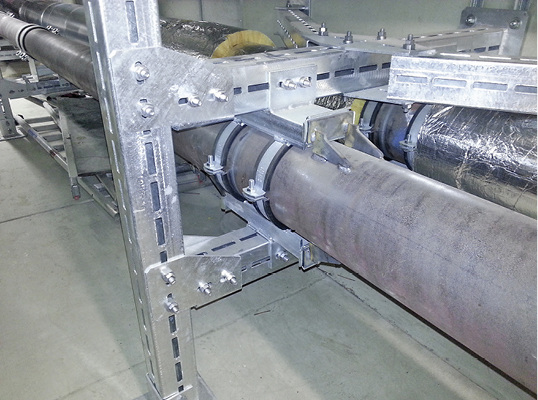 Bei großen Rohrdurchmessern kommen Festpunkte zum Einsatz, die über zwei Druckstücke verfügen und somit die doppelte Last aufnehmen können, etwa der Mefa-Festpunkt Typ B.