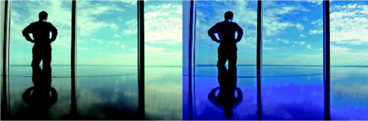 Blauer Himmel — blaue Scheiben: Hightech-Fensterscheiben können jetzt auf Knopfdruck oder automatisch über ein Bussystem die Sonneneinstrahlung regulieren.