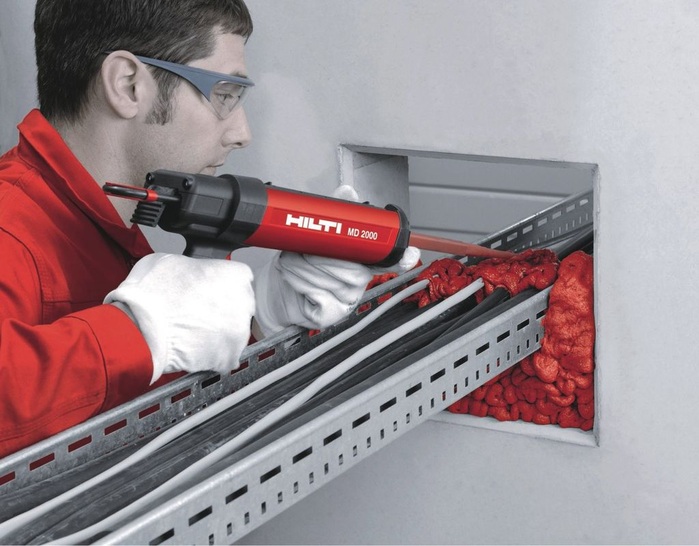 Hilti: Mit dem Brandschutzschaum CP 660 können nachträgliche Kabelinstallationen ohne Vorbohren durchgeführt werden. - © Hilti
 Hilti: Mit dem Brandschutzschaum CP 660 können nachträgliche Kabelinstallationen ohne Vorbohren durchgeführt werden.