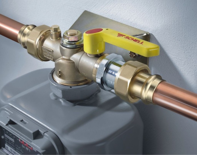Schell: Gas-Einrohrzähler-Armatur in Durchgangsform mit beigefügter Wandhalterung.