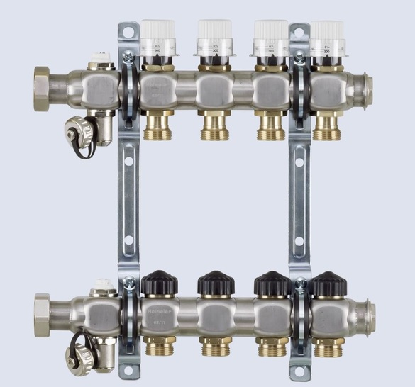 TA Heimeier: Dynacon Verteiler zur ­dynamischen Regelung des Durchflusses von ­Flächenheizungen.