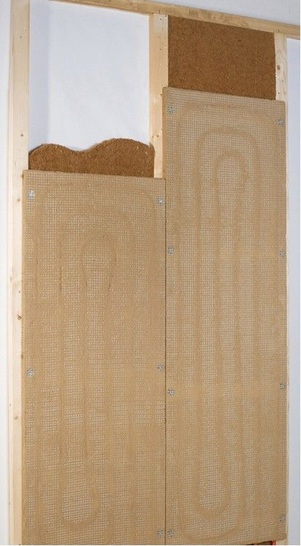 WEM Wandheizung: Wandheizungsplatte aus Lehm in einer Trockenbauwand. - © WEM Wandheizung
