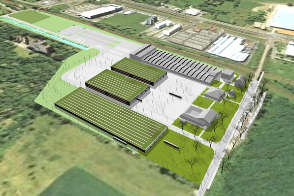 Bild 1 Standort Heiterblick der Leipziger Verkehrsbetriebe: Erkennbar sind die beiden fast baugleichen Hallen Haupt- und Betriebswerkstatt, die Instandhaltungswerkstatt (große graue Halle im Hintergrund), das Straßenbahndepot im Vordergrund und die Verwaltungs- und Sozialgebäude (grau entlang der Zufahrtsstraße).