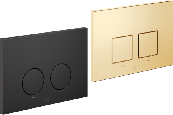  Links die runde WC-Betätigungsplatte in Schwarz matt, rechts die eckige in Gold (23kt).