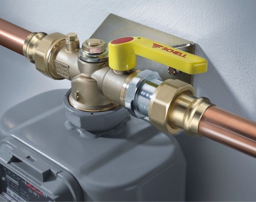Schell: Gas-Einrohrzähler-Armatur in Durchgangsform mit beigefügter Wandhalterung.
