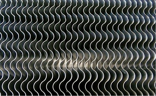 Howatherm: Anströmungsseite eines Wärmeübertragers mit neuer Hochleistungslamelle.