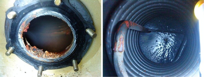 Abb. 1 Verkrustungen und schlammige Ablagerungen in einem zu lange nicht gewarteten Speicher-Trinkwassererwärmer.